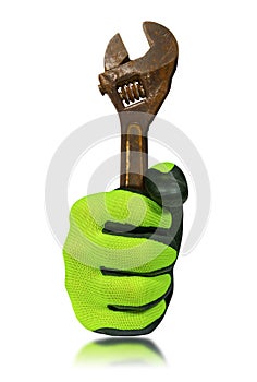 Gloved Hand Holding an Old Rusty Adjustable Wrench Isolated on White