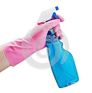 Gloved hand holding a spray bottle