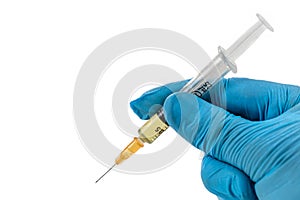 Gloved hands holding a syringe Concepts of medical treatment, epidemic or vaccine