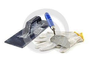 Gloves with trowel isolated on white background