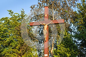 The glow of God`s Cross against heaven