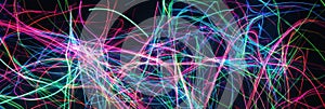 Glowing abstract neon lines create vibrant patterns against a dark background. Generative AI