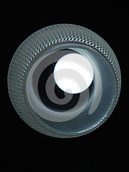 glowing ball in a gray-blue glowing ring