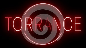 Glowing and blinking red retro neon sign for TORRANCE