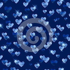 Glowing blue hearts sequins background.