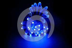 Glowing blue led pixels christmas holiday lights on black background