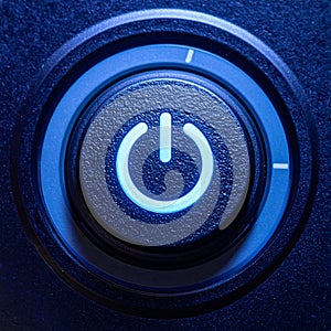 Glowing Blue Power Button Activated on a Device