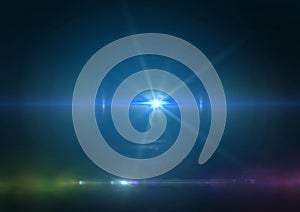 Glowing blue spot of light and light trails on blue background