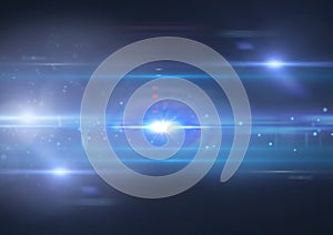 Glowing blue spots of light and light trails over blue background