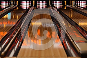 Glowing Bowling Alley Lanes with Pins.