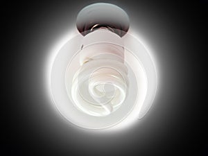 Glowing bulb in black circle