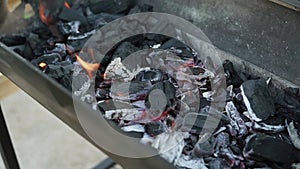 Glowing charcoal in the grill