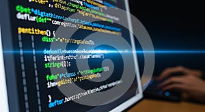 Glowing code on screen depicting software development