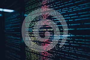 Glowing computer code with green and red text on a dark screen programming technology