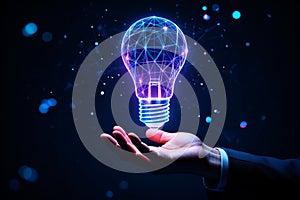 Glowing digital lightbulb held in hand technology