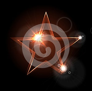 Glowing glossy star shape on black background
