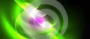 a glowing green and purple swirl on a black background