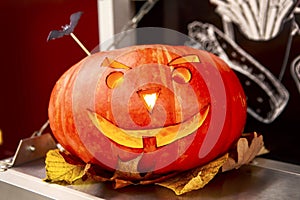 Glowing Halloween Pumpkin on the table