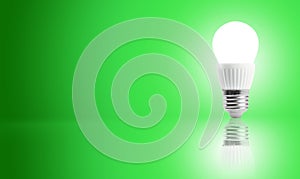 Glowing LED energy saving bulb.