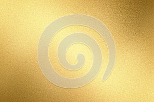 Glowing light brass metal wall texture, abstract pattern background photo