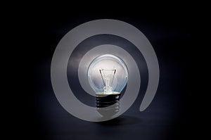 Glowing light bulb in dark.creativity inspiration concept