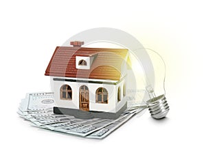 Glowing light bulb, model of house and banknotes on background. Energy efficiency, loan, property or business idea concepts