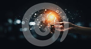 Glowing Lightbulb in Hand with Digital Network Lines Symbolizing Innovation and Futuristic Connectivity