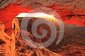 Glowing Mesa Arch at sunrise, Canyonlands National Park, Utah, U