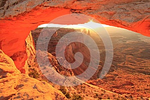 Glowing Mesa Arch at sunrise, Canyonlands National Park, Utah, U