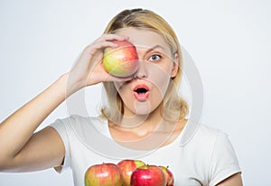 Glowing with natural beauty. farming concept. healthy teeth. Happy woman eating apple. orchard, gardener girl with apple