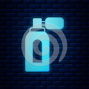 Glowing neon Aftershave bottle with atomizer icon isolated on brick wall background. Cologne spray icon. Male perfume