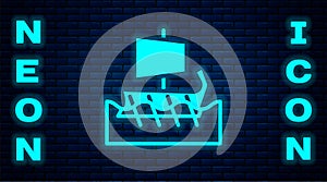 Glowing neon Ancient Greek trireme icon isolated on brick wall background. Vector