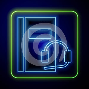 Glowing neon Audio book icon isolated on blue background. Book with headphones. Audio guide sign. Online learning
