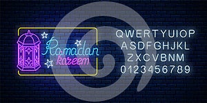 Glowing neon banner of ramadan islamic holy month with alphabet. Ramadan kareem greeting text with fanus lantern