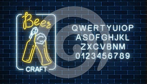 Glowing neon beer craft signboard in rectangle frame and alphabet. Luminous advertising sign of night club with bar.