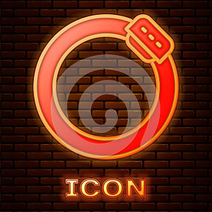 Glowing neon Bicycle brake disc icon isolated on brick wall background. Vector