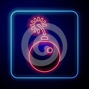 Glowing neon Bomb ready to explode icon isolated on blue background. Vector