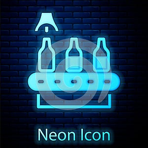 Glowing neon Brewery factory production line pouring alcoholic drink in glass bottles icon isolated on brick wall