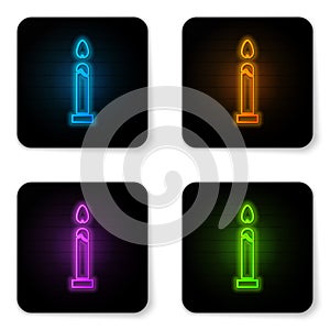 Glowing neon Burning candle icon isolated on white background. Cylindrical candle stick with burning flame. Black square