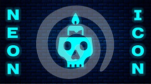 Glowing neon Burning candle on a skull icon isolated on brick wall background. Day of dead. Vector