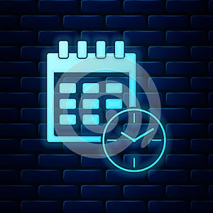 Glowing neon Calendar and clock icon isolated on brick wall background. Schedule, appointment, organizer, timesheet
