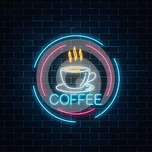 Glowing neon coffee cup icon in circle frames. Light effect hot beverage or cafe sign.