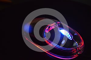 Glowing neon computer mouse