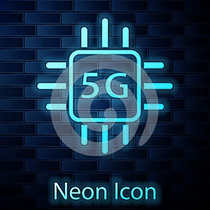 Glowing neon Computer processor 5G with microcircuits CPU icon isolated on brick wall background. Chip or cpu with