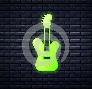Glowing neon Electric bass guitar icon isolated on brick wall background. Vector