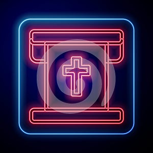 Glowing neon Flag with christian cross icon isolated on black background. Vector