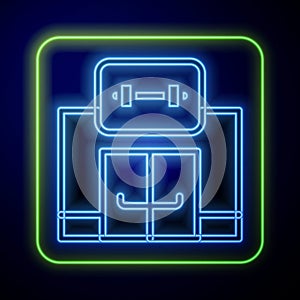 Glowing neon Gym building icon isolated on blue background. Sport club. Vector