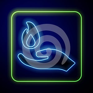 Glowing neon Hand holding a fire icon isolated on blue background