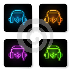 Glowing neon Headphones for meditation icon isolated on white background. Black square button. Vector