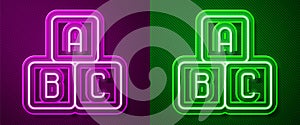Glowing neon line ABC blocks icon isolated on purple and green background. Alphabet cubes with letters A,B,C. Vector